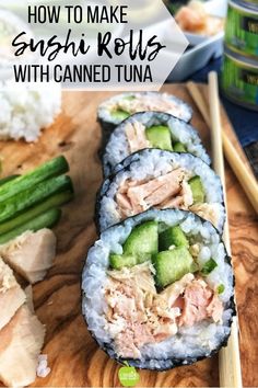 sushi rolls with tuna and cucumber on a cutting board next to chopsticks