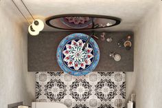 an overhead view of a bathroom with a sink, toilet and mirror on the wall