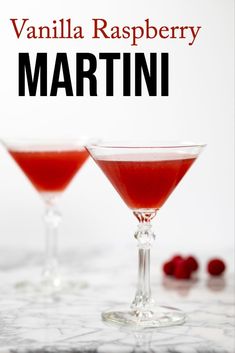 raspberry martini in coupe glasses with text overlay