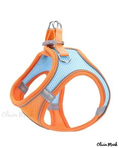 an orange and blue dog harness on a white background with the collar attached to it