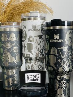 the star wars tumblers are lined up next to each other