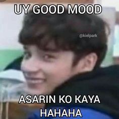 an image of a man smiling with the caption'uy good mood '