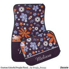 two personalized car mats with flowers and butterflies in purple, orange, and blue