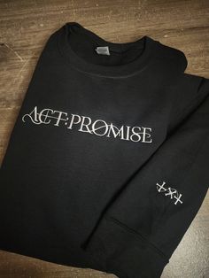 TXT ACT:PROMISE embroiderd on a super soft crewneck sweatshirt. With TXT logo on right sleeve. Get this now before the 2024 World Tour! Black Crew Sweatshirt With Embroidered Text, Black Embroidered Text Sweatshirt Crew Neck, Long Sleeve T-shirt With Embroidered Text For Streetwear, Txt Embroidery, Embroidered Crew Neck Sweatshirt For Streetwear, Streetwear Crew Neck Sweater With Embroidered Text, Crew Neck Sweater With Embroidered Text For Streetwear, Embroidered Text Crew Neck Sweater For Streetwear, Txt Logo