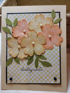 a birthday card with flowers on it