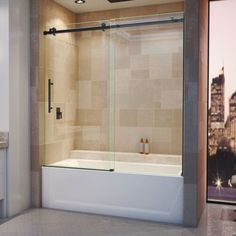 a bathroom with a bathtub, sink and shower in the middle of the room