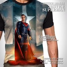 the man is wearing a superman t - shirt