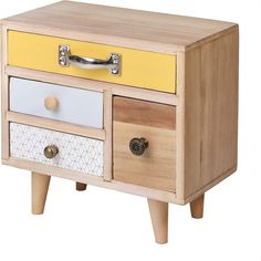 a yellow and white chest of drawers on wooden legs with knobs in the drawer