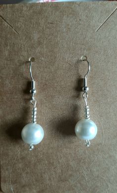 pretty faux pearl and bead earrings a variety of colours and can be on gold or silver tone ear wires ideal gift 2cm drop lengthearrings now available as clip ons Adjustable Dangle Pearl Earrings With Pearl Charm, Pearl Beaded Round Earrings, Adjustable Pearl Drop Earrings, Beaded Pearl Drop Earrings, Pearl Beaded Drop Earrings With Pearl Charm, Pearl Beaded Drop Earrings, Adjustable Pearl White Dangle Earrings, Adjustable Beaded Pearl Earrings As Gift, Beaded Pearl White Drop Earrings