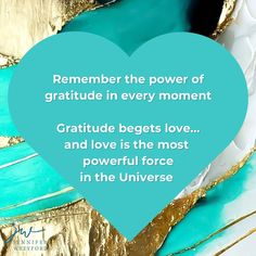 a blue heart with gold foil on it and the words, remember the power of gratitude in every moment