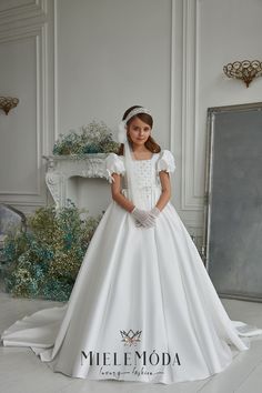 Designed and proudly made in Europe. Ships from the USA. PLEASE NOTE: Any accessories pictured (i.e. mask, headpiece, gloves, capes, veils, etc.) are available for purchase upon request and not included in this listing unless otherwise stated. Girls Communion Dresses, Holy Communion Dresses, Princess Silhouette, 파티 드레스, First Communion Dress, First Communion Dresses, Custom Gown, Embroidered Bodice, Gowns For Girls