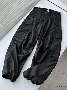 Easton Cargo Pants with Spliced Details Casual Patchwork Tapered Leg Bottoms, Baggy Wide Leg Cargo Pants With Patchwork, Patchwork Full Length Bottoms For Streetwear, Patchwork Bottoms For Streetwear, Black Full-length Parachute Pants With Patch Pockets, Casual Wide Leg Cargo Pants With Patchwork, Casual Wide-leg Patchwork Cargo Pants, Casual Wide Leg Patchwork Cargo Pants, Casual Full Length Patchwork Bottoms