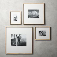 black and white photographs hanging on the wall