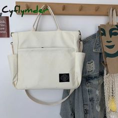 Woman Canvas Tote Shoulder Messenger Bag Handbag With An External Pocket Reusable Grocery Shopping Bags Zipper Closure SPECIFICATIONS Types of bags: Shoulder & Handbags Size: 29*10*31cm/11.4*3.9*12.2inch(Manual measurement, may be 1-3cm error) Shape: Casual Tote Products include: 1* Shoulder Bag Product Name: Shoulder Bag Occasion: Dating, School, Travel, Work, Daily Number of Handles/Straps: Three Main Material: Canvas Lining Material: Polyester Length of Shoulder Strap: 110cm/43.3inch Interior: Cell Phone Pocket Handbags Type: Shoulder Bags Function: Make up, Umbrella,Sunglasses, Mobile Phone, Sundry Storage Exterior: Open Pocket Colour: Beige,Brown,Light Blue,Yellow,Black Closure Type: zipper Describe Material: Canvas Inside Material: Polyester Fiber Open Way: Zipper Outside Of The Bag: Womens Messenger Bag, Grocery Shopping Bags, Casual Tote Bag, Pocket Handbag, Cell Phone Bag, Casual Tote, Shoulder Messenger Bag, Canvas Shoulder Bag, Types Of Bag