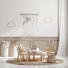 a baby's room with white walls and wooden furniture, including a round table