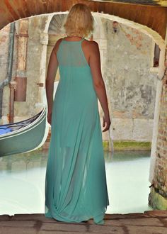 Summer dress. Venetian long kaftan made of a gorgeous turquoise that will match the sea this summer. Classy party dress blending with the beautiful and sensual streets of Venice. Very comfortable and soft sheer summer dress. This piece comes with an underneath turquoise dress made of the finest viscose. Two pieces for this item! Material: 100% chiffon underneath dress: 95% viscose, 5% elastane Care instructions: Wash at 30 degrees The model in the picture is size S. Can be made in ALL SIZES. If Turquoise Floor-length Summer Dress, Classy Maxi Dress Summer, Elegant Turquoise Maxi Dress, Elegant Turquoise Maxi Dress For Party, Elegant Turquoise Party Maxi Dress, Elegant Turquoise Maxi Dress For Vacation, Fitted Turquoise Maxi Dress For Party, Classy Party Dress, Venetian Dress