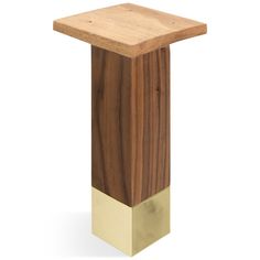 a wooden and brass pedestal with a square base on the top, against a white background