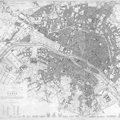 an old map of the city of paris, with streets and buildings in black ink