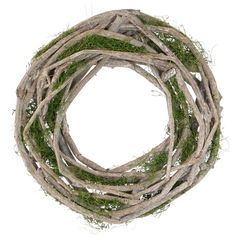 a wreath made out of branches with moss growing on the top and bottom, in front of a white background