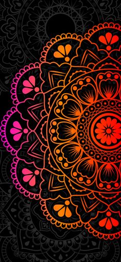 an abstract colorful flower on a black background with red, pink and orange flowers in the center