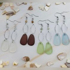 Handmade Natural Sea Glass And Natural Stone Silver Plated Marquise Charm Lightweight Dangle Earrings. Material: Silver Plated Stainless Steel, Natural Gemstone Beads Size: 2.5 Inch By .5 Inch The Magic Of Sea Glass Sea Glass Completely Embodies All The Properties Of The Ocean And The Seaside In Every Possible Way. The Allure Of These Hybrid Man And Nature Made Gems Is As Captivating As The Ocean Itself. For Years The Sea Glass Has Been Cleansed By The Healing Properties Of The Salt Water As It Resin Sea, Clear Sea, Brown Sea, Sea Glass Colors, Mermaid Earrings, Bridal Earrings Drop, Sea Glass Earrings, Light Earrings, Necklace For Girlfriend