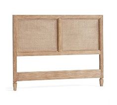 the headboard is made out of wood and wicker