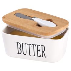 a butter container with a knife in it