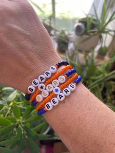 The Chicago Bears Collection is here!  These bracelets are a fun way to show off your love of the Bears and look great together and individually. Bracelets are available for purchase individually or as a 2-stack (your choice). If selecting the 2-stack option, please include in the "Add personalization" box your bracelets of choice. How to Measure for Your Bracelet Size: Measure your wrist with a tape measure at the point where you like your bracelet to sit on your wrist.  If you don't have acces Blue Beaded Bracelets For Team Spirit Gift, Blue Team Spirit Beaded Bracelets As Gift, Sports Team Beaded Bracelets, Nfl Clay Bead Bracelets, Sporty Adjustable Beaded Bracelets For Game Day, Nfl Beaded Bracelets, Team-colored Bracelets With Letter Beads For Sports, Chicago Bears Gifts, Seed Beads Jewelry