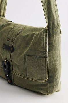 Classic look messenger bag with a flap top closure. Washed cotton bag with a secure latch closure front and rivet accents at the shoulder strap. Features Patched messenger bag Washed cotton bag Flap front Secure buckle down closure Shoulder strap Content + Care 100% Cotton Spot clean Imported | Patched Messenger Bag in Olive, Men's at Urban Outfitters Canvas Satchel Shoulder Bag With Snap Closure, Casual Canvas Flap Shoulder Bag, Everyday Canvas Satchel With Snap Closure, Urban Outfitters Everyday Shoulder Bag, Everyday Canvas Flap Bag With Adjustable Strap, Canvas Satchel Bag With Snap Closure, Everyday Canvas Bag With Flap And Adjustable Strap, Everyday Canvas Bag With Adjustable Strap And Flap, Outdoor Flap Satchel With Adjustable Strap