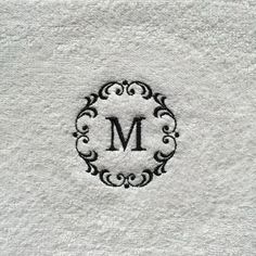 a monogrammed towel with the letter m on it