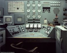 an old control room with many different controls