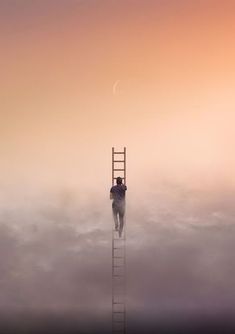 a man standing on top of a ladder in the middle of a foggy sky