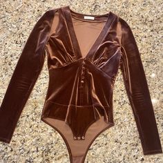 Never Worn And In Perfect Condition! Color Is A Very Pretty Dark Rose Gold. Material Gives A Held In Sensation, Can Be Worn With Or Without And Bra Is Desired! Dark Rose, Gold Material, Low Cut, Womens Tops, Rose Gold, Velvet, One Piece, Bra, Long Sleeve