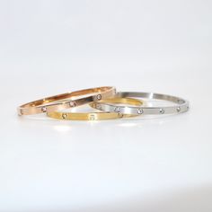 Basically a tradition. Our Ruth Bangle Bracelet is the traditional wrist companion you need for adding a touch of luxury to any outfit. Perfect to stack or to wear solo - Ruth is versatile and gorgeous. Buckle Bracelet, Stone Collection, Silver Bangle, Drop Necklace, Chain Ring, Silver Bangles, Tennis Bracelet, Chain Pendants, Bezel Setting