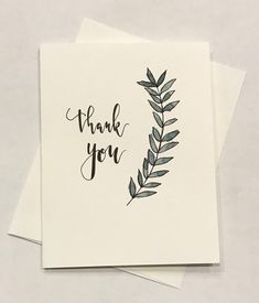 two cards with the words thank you written in black ink on top of each card