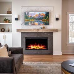 a living room filled with furniture and a fire place in front of a flat screen tv