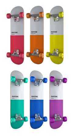 six skateboards with different colors and designs on the top one is white, yellow, blue, pink, green, orange