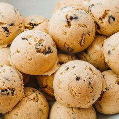 a white bowl filled with chocolate chip cookies