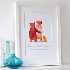 three bears holding hands in watercolor on white paper with blue vase and bottle nearby