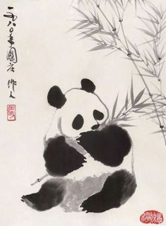 a panda bear sitting on top of a bamboo tree