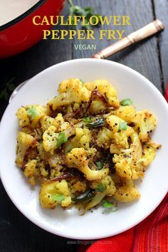 cauliflower pepper fry on a white plate