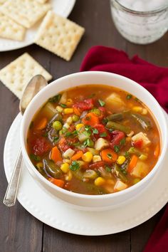 a white bowl filled with soup on top of a table