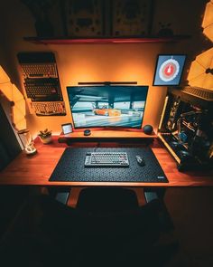 a computer desk with a monitor, keyboard and mouse