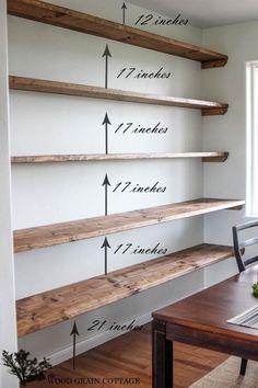 the shelves are labeled with numbers and measurements for each shelf in this home office area