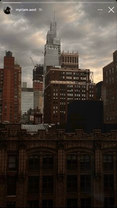 an image of a city skyline taken from the roof of a building with skyscrapers in the background