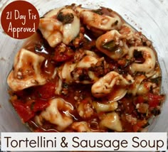 tortellini and sausage soup in a bowl with the words, 21 day fix approved