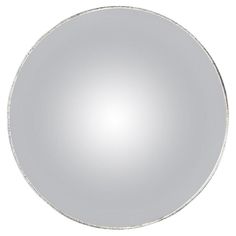 a round mirror on a white background with no image to describe, it's not clear