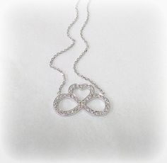 "Our Cutoff Date for Christmas delivery is Sunday Dec. 13, 2020 All Order placed after this date will be completed for mid January delivery. Unconditional love This Infinity Heart necklace features 14k gold at a hefty 1.5 mm thick adorned with 42 round Brilliant cut diamonds. **FREE SHIPPING** The necklace suspends from a cable Link chain with 4 choices of length: 14\",16\", 18\" and 20\" . Whatever the occasion is, weather its a necklace for girlfriend, necklace for bridesmaids, necklace for si Diamond White Infinity Jewelry For Gift, Infinity Jewelry With Diamond Accents For Gift, White Infinity Necklace For Anniversary, Necklace For Bridesmaids, Diamond Infinity Necklace, Girlfriend Necklace, Necklace Infinity, Infinity Love, Necklace Love