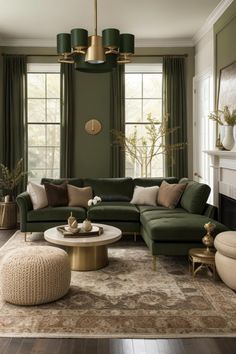 a living room with green couches and chairs around a coffee table in front of two windows