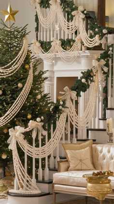 a decorated christmas tree sitting next to a white couch